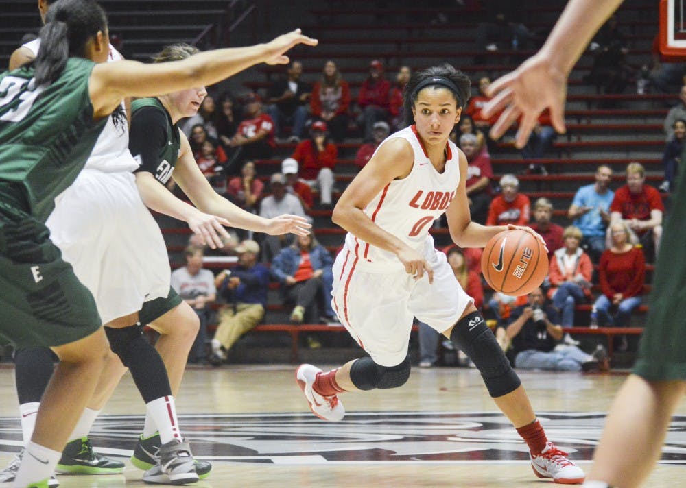 Lobo freshman guard Cherise Beynon dribbles past Eastern New Mexico defenders during the exhibition game at the Pit on Nov. 9. The Lobos will host top-ranked Stanford at 7 p.m. tonight at the Pit.