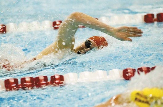 UNM swimmer Jenna Syverson finishes first place in the 50-yard freestyle Thursday at the Seidler Natatorium. The Lobos finished in second place overall at the home meet.