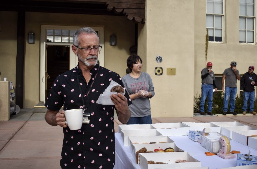 University of New Mexico students, staff and faculty enjoy donuts and coffee on Donut Day, Wednesday, Oct. 3, kicking off the start of the UNM Gives Campaign.