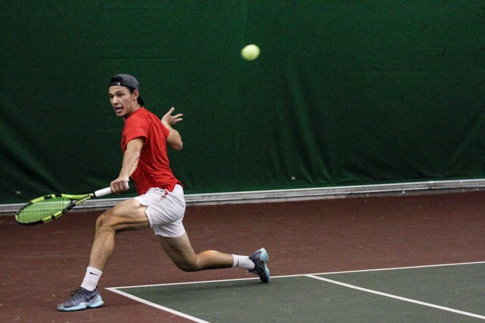 Ricky Hernandez Tong returns a shot during the Lobos’ match against the University of California, Santa Barbara Feb. 25, 2018. UNM beat UCSB, 4-3