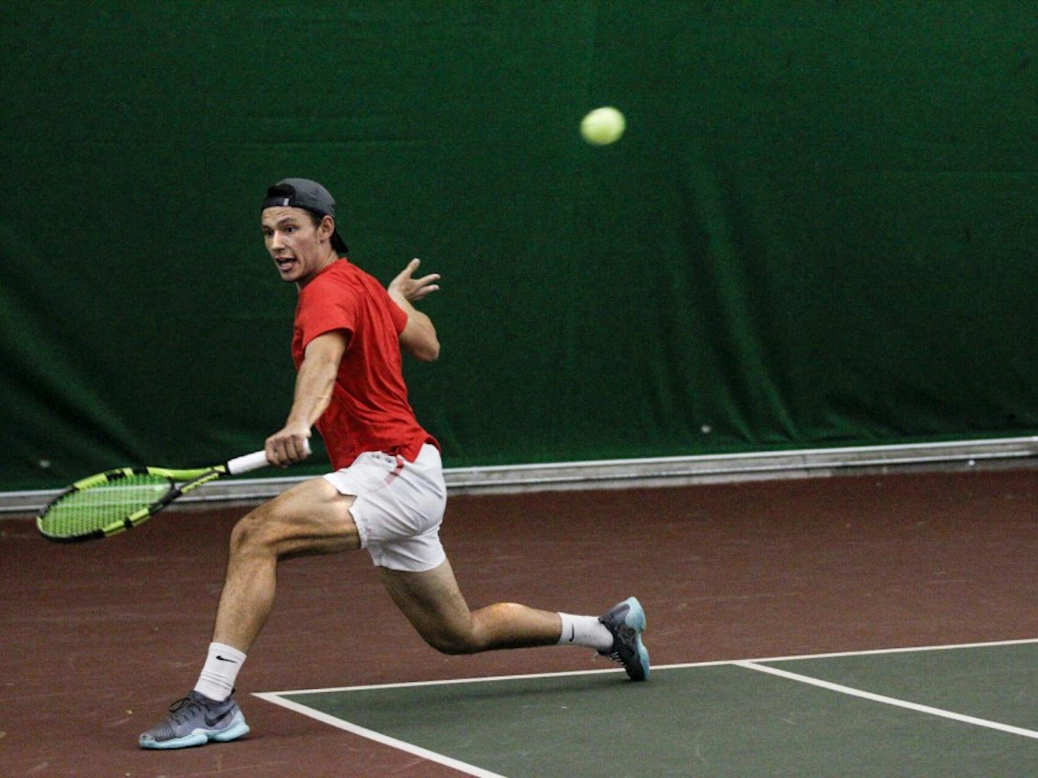 Ricky Hernandez Tong returns a shot during the Lobos’ match against the University of California, Santa Barbara Feb. 25, 2018. UNM beat UCSB, 4-3