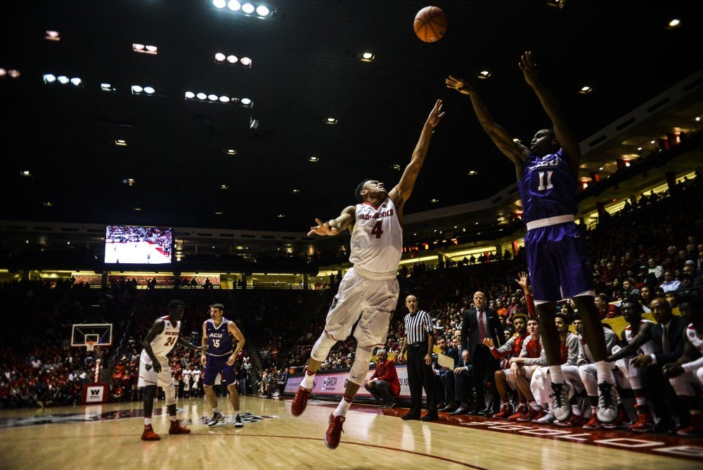Redshirt junior guard Elijah Brown leaps in front of a Abilene Christian player in an attempt to block a shot Wednesday, Nov. 30, 2016 at WisePies Arena. The Lobos went up against New Mexico State this past Saturday and lost 84-71.&nbsp;