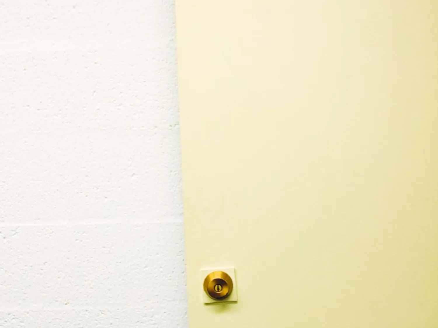 Representatives of the LGBTQ Resource Center set an “Open” sign on the door
to the building near Dane Smith Hall. The on-campus center, which opened
Aug. 27, welcomes students of any sexual orientation to seek support.
