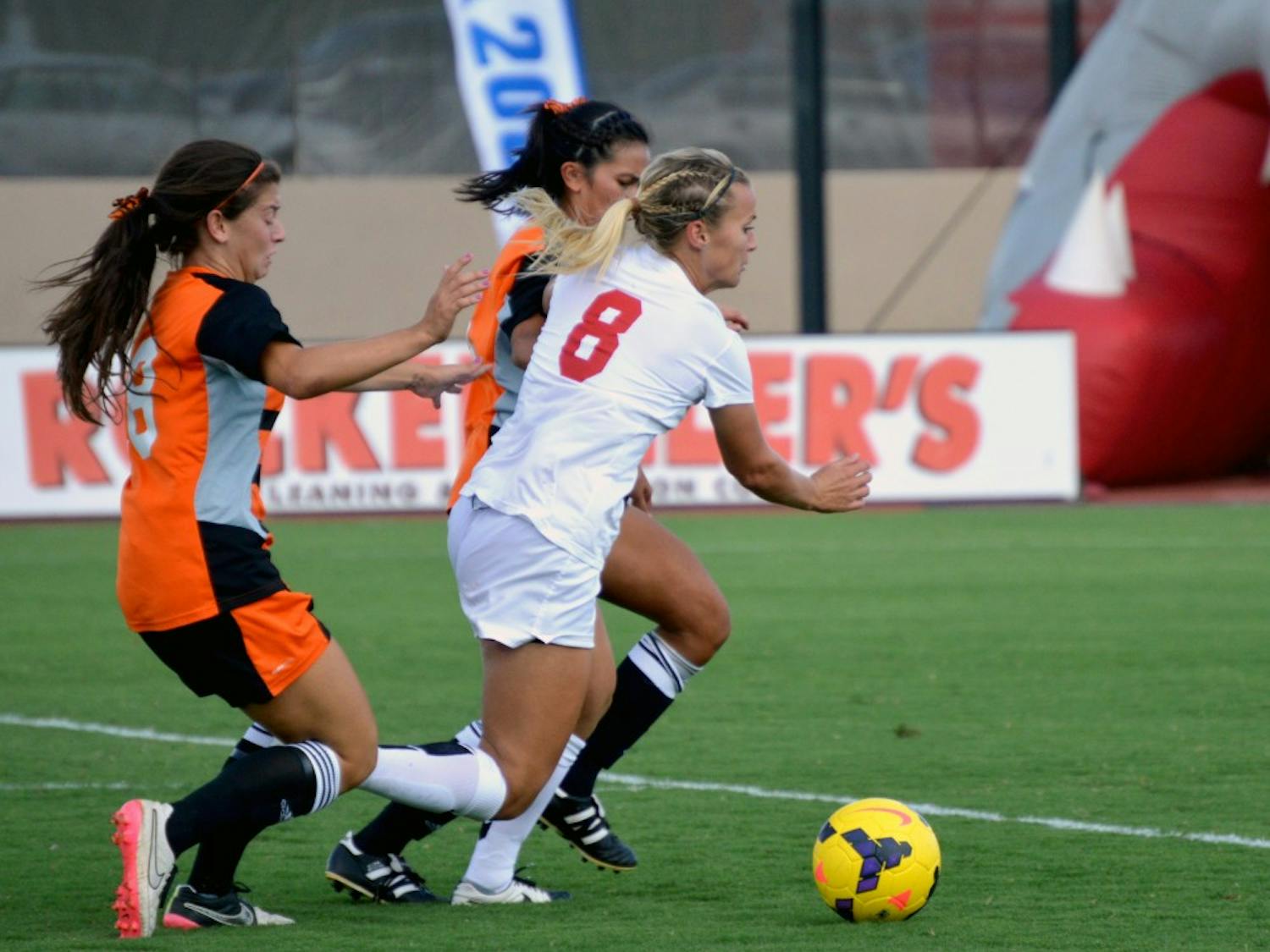 Lobo's forward Korynn Blanksma battles with two Idaho State players during their game Sept. 3, 2015. The Lobos play the Nevada Wolf Pack Friday at 7 p.m..