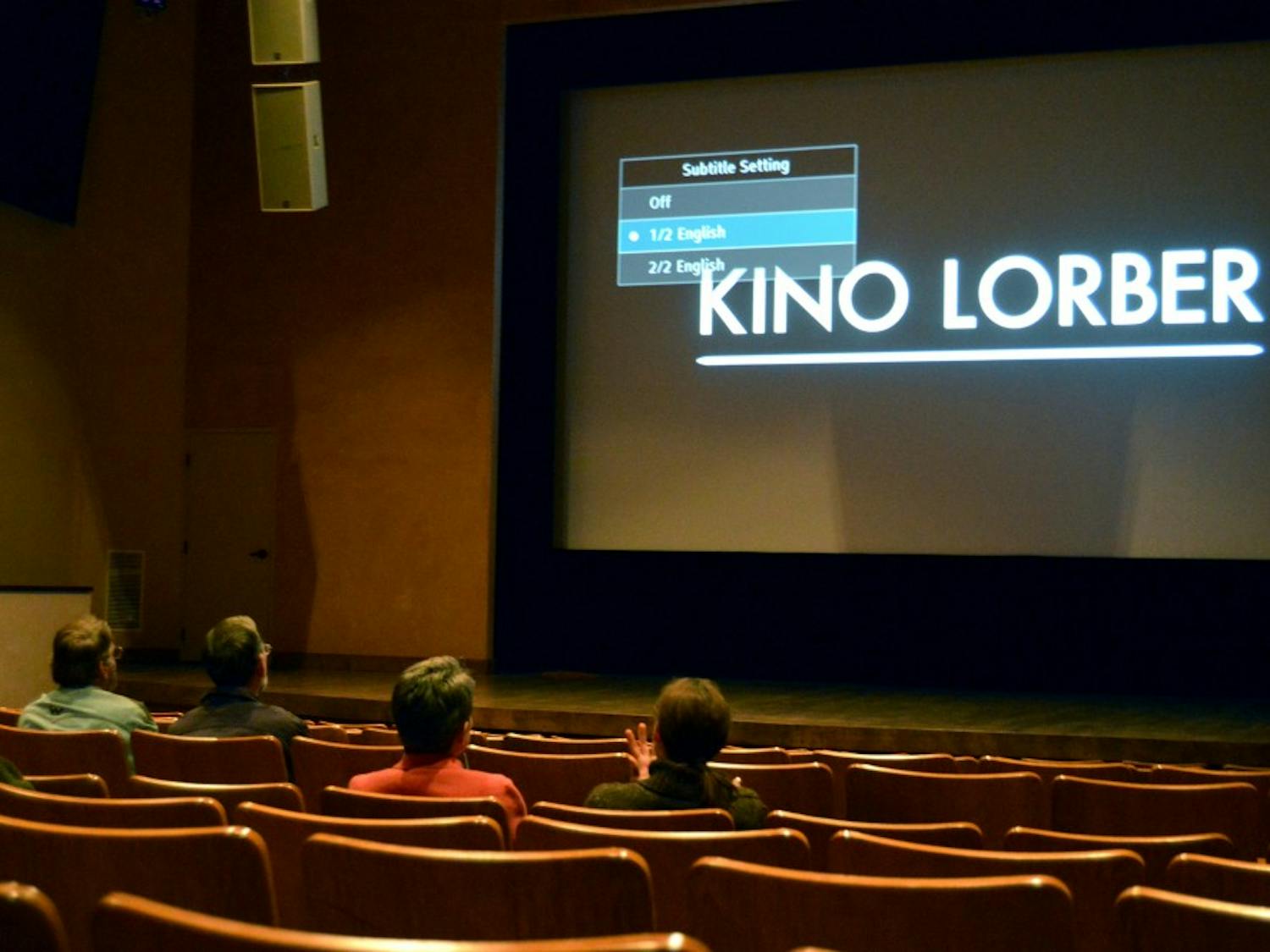 Attendees of an educators workshop sit at the Bank of America Theater in the National Hispanic Cultural Center. The workshop and film screening was intended to show educators how to address topics of immigration in their class rooms.