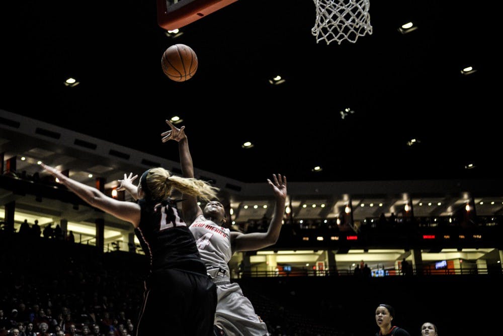 Redshirt junior guard&nbsp;Alex Lapeyrolerie attempts an inside jump shot against San Diego State University Saturday, Dec. 31, 2016 at WisePies Arena. The Lobos will face off with Utah State in hopes to obtain their third conference win.&nbsp;