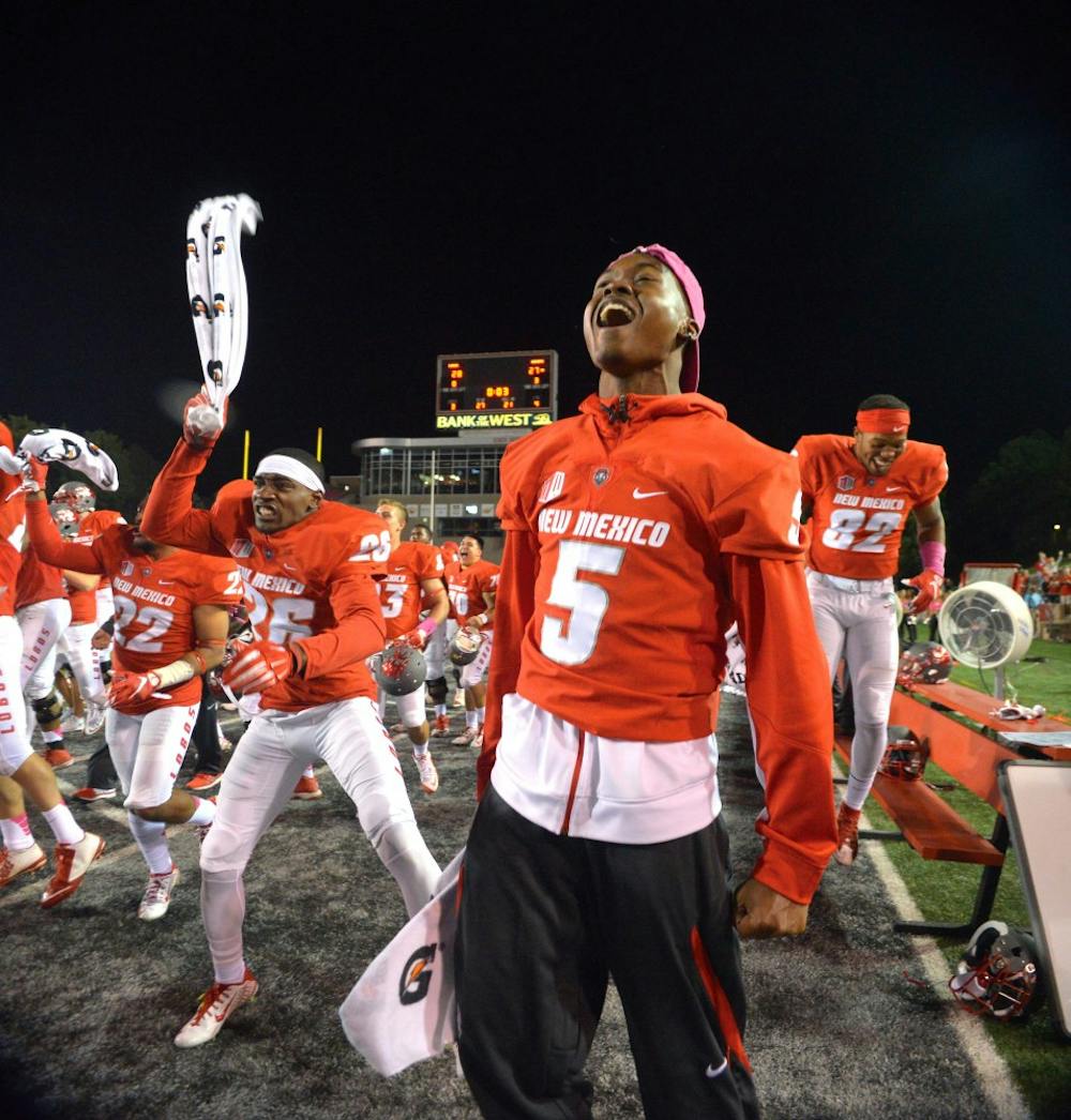 The Lobos celebrate moments before the end of their game against Hawaii University at University Stadium Oct. 17. The Lobos beat Boise State 31-24 this Saturday&nbsp;making them eligible for a bowl game and two victories away from entering the Mountain West Championships.&nbsp;