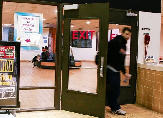 Student Steve Romero leaves Johnson Gym just before it closes on Sunday. 