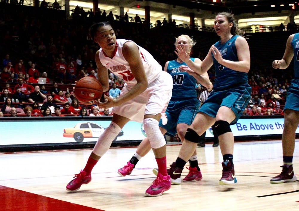 Senior Khadijah Shumpert guards the ball from Nevada players&nbsp;Friday evening at WisePies Arena.&nbsp;The Lobos won against Nevada 66-42.