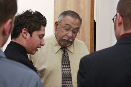 Student Arman Salehian talks to Sen. Phil Griego at the Roundhouse on Monday. Salehian was one of dozens of students who went to lobby legislators in Santa Fe for Lobo Day.