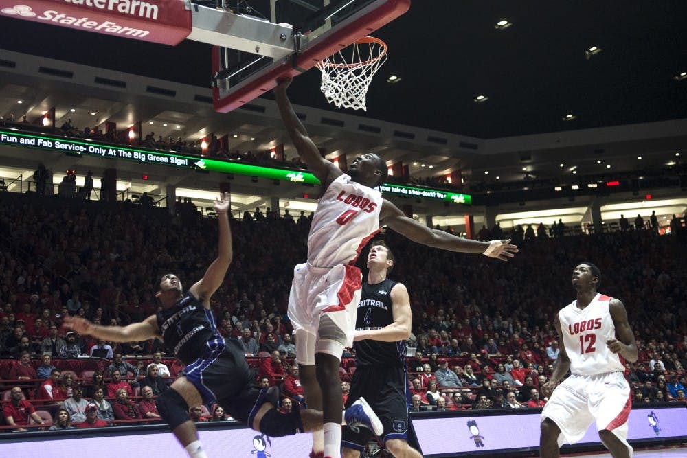 New Mexico center J.J. N'Ganga, 0, goes up for a block during the game against Central Arkansas on Dec. 17 at WisePies Arena. The Lobos defeated the Bears 76-55.