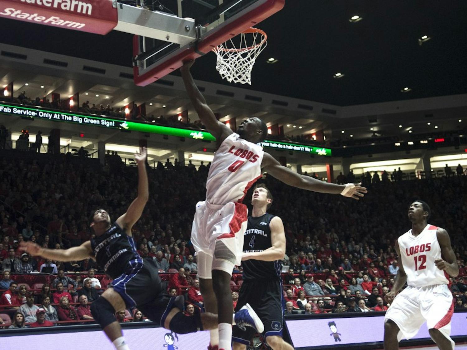 New Mexico center J.J. N'Ganga, 0, goes up for a block during the game against Central Arkansas on Dec. 17 at WisePies Arena. The Lobos defeated the Bears 76-55.