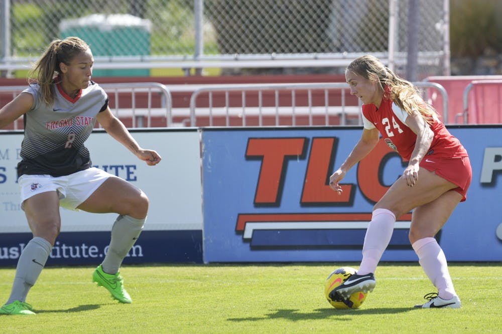 Senior forward Madisyn Olguin tries to pass Fresno State’s Fanny Johansson at the UNM Soccer Complex on Sunday, Oct. 18. The Lobos beat Air Force 3-0 on Sunday, Oct. 26. 