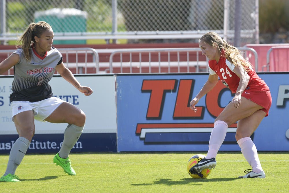 Senior forward Madisyn Olguin tries to pass Fresno State’s Fanny Johansson at the UNM Soccer Complex on Sunday, Oct. 18. The Lobos beat Air Force 3-0 on Sunday, Oct. 26. 