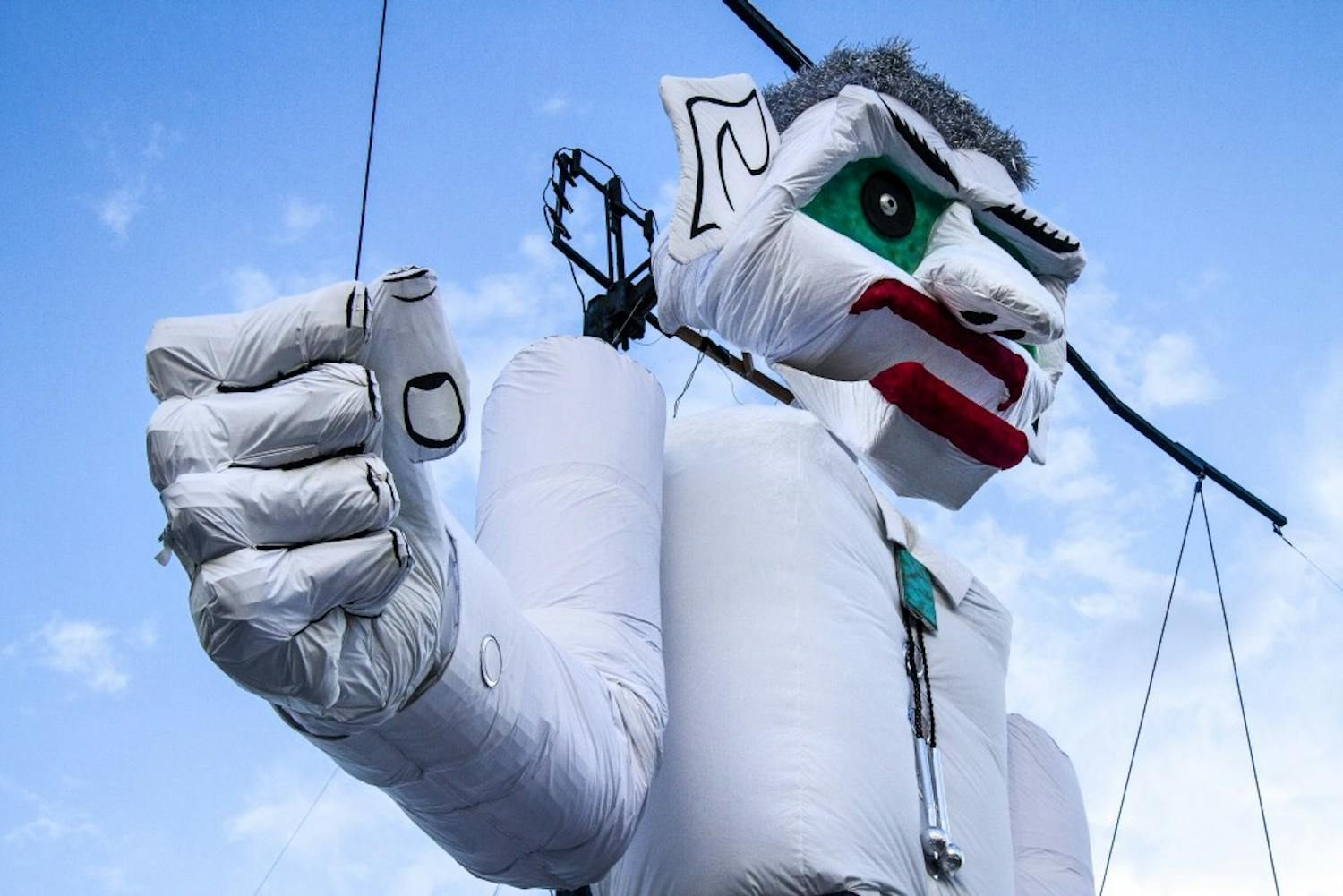 The 50-foot-tall Zozobra marionette is suspended midday on the first day of Fiestas De Santa Fe on Monday, Aug. 31, 2018.