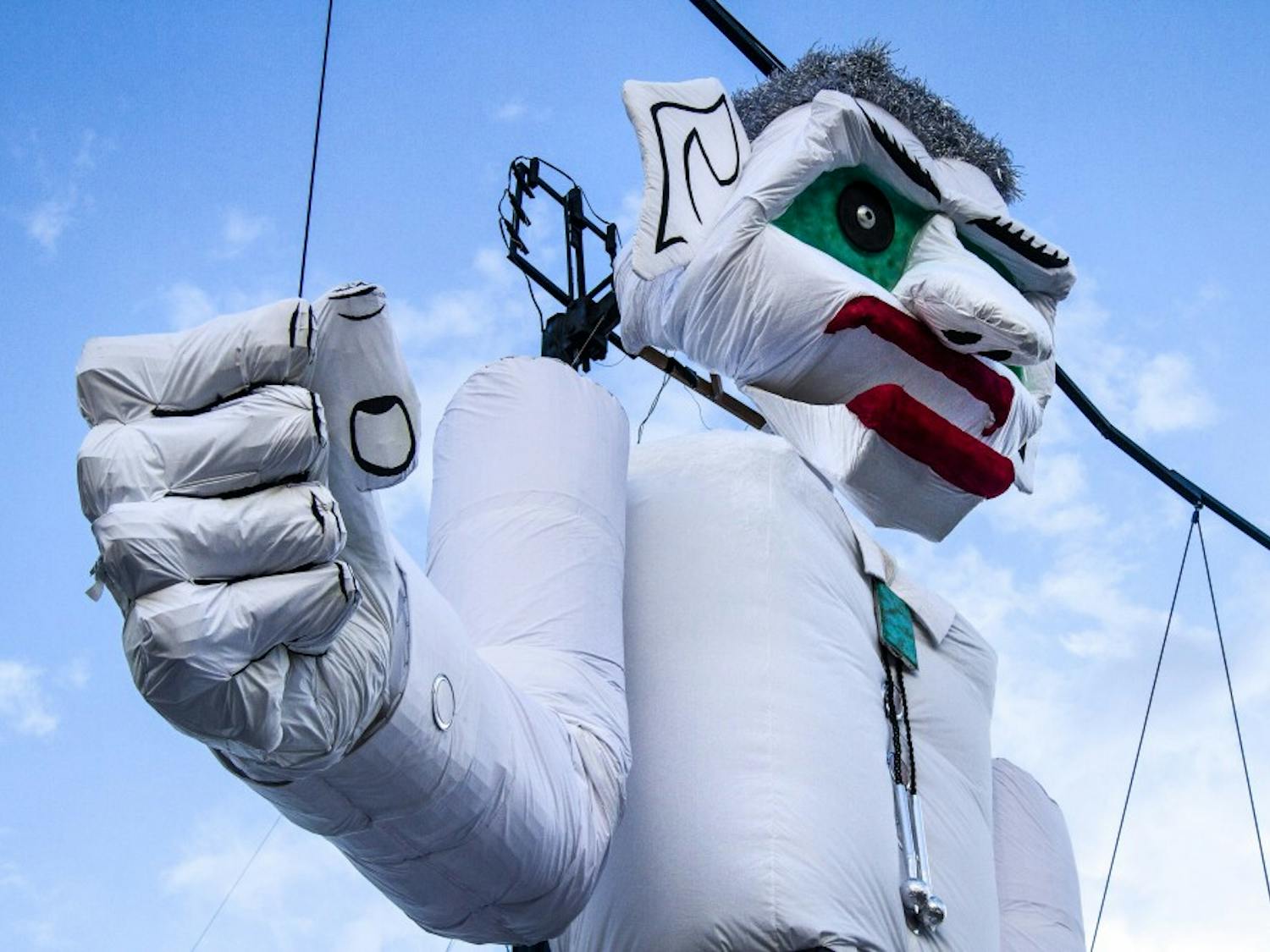 The 50-foot-tall Zozobra marionette is suspended midday on the first day of Fiestas De Santa Fe on Monday, Aug. 31, 2018.