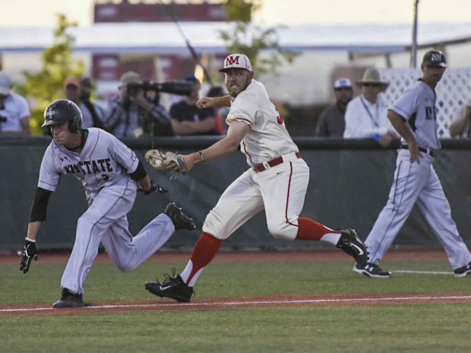 Senior Carl Stajduhar tags out a New Mexico State Aggie Tuesday, May 2, 2017 at Santa Ana Star Field. The Lobos lost to the Aggies 12-5. 