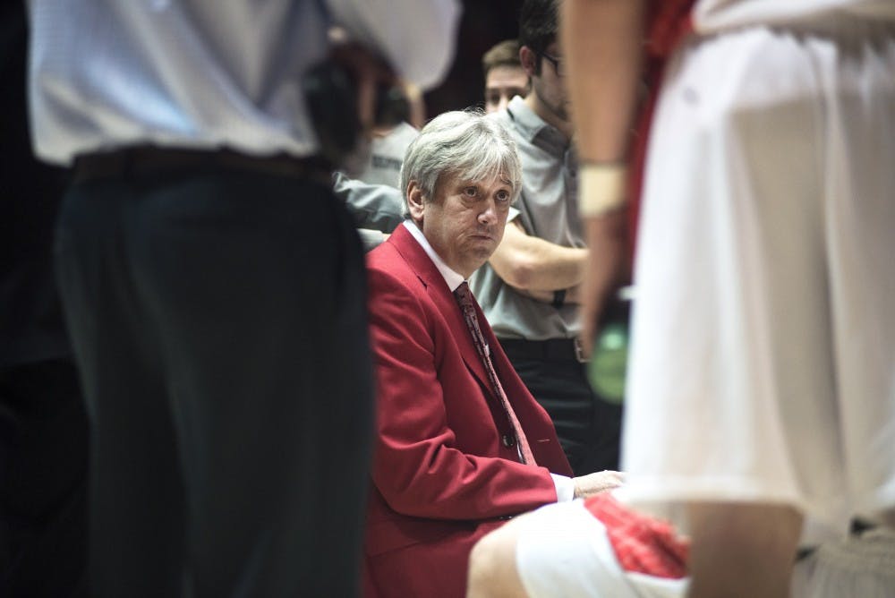 New Mexico basketball head coach Craig Neal reviews game notes during the game against San Diego State last season. The upcoming Lobo season will see nine new recruits along with a new assistant coach, strength coach, video coordinator and director of basketball operations.