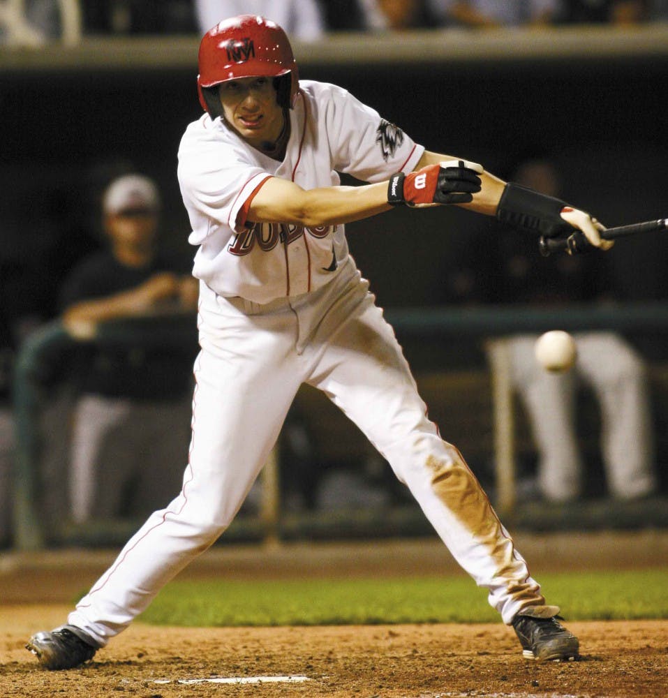 Center fielder Matt Foote fouls off a ball in the sixth inning of the Lobos' 13-6 win against NMSU at Isotopes Park on Tuesday. Foote went 2-for-4 with four RBIs, two runs, two walks and two stolen bases. 