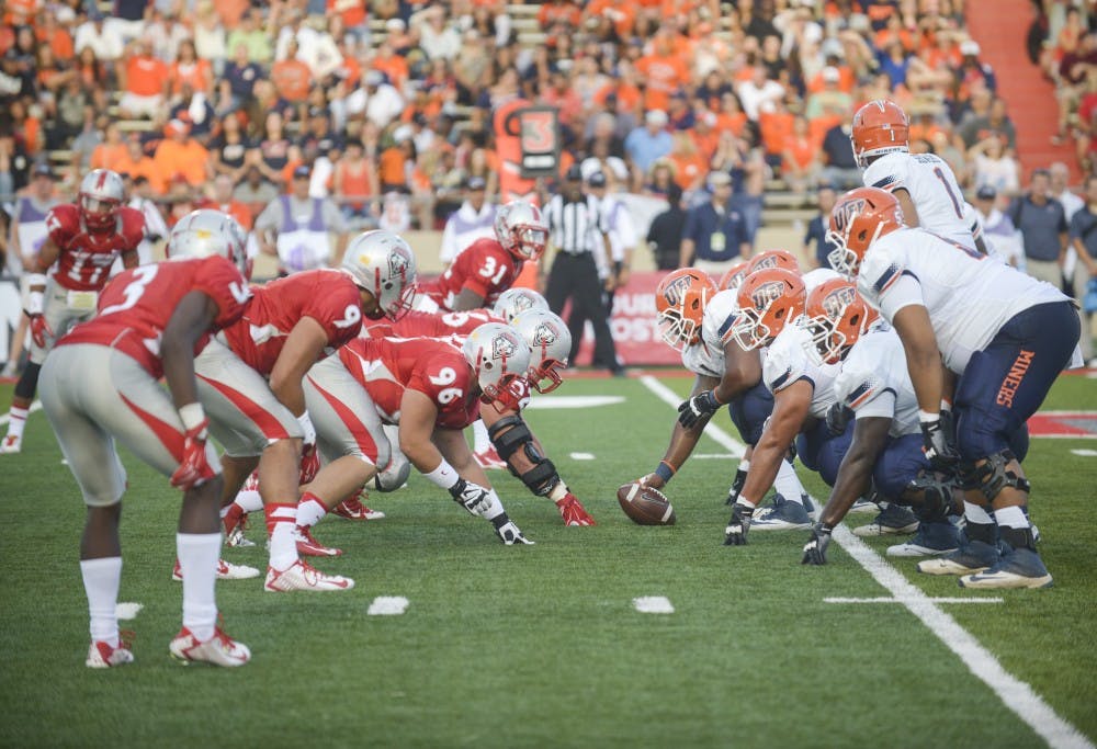 	The UNM defense lines up against UTEP during the season opening game at University Stadium on Saturday night. The Lobos will host No. 17 Arizona State at 5 p.m. Saturday
