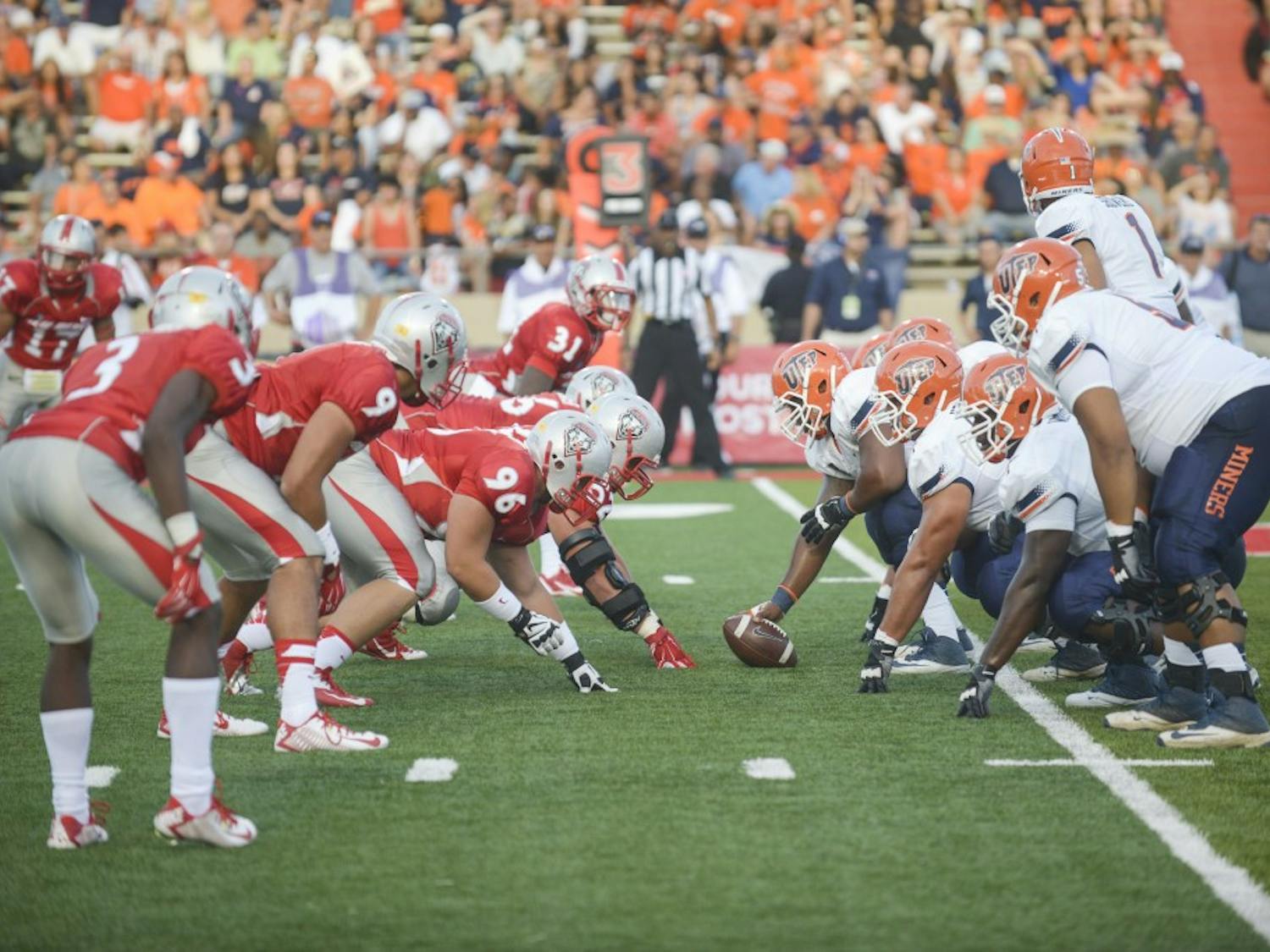 The UNM defense lines up against UTEP during the season opening game at University Stadium on Saturday night. The Lobos will host No. 17 Arizona State at 5 p.m. Saturday