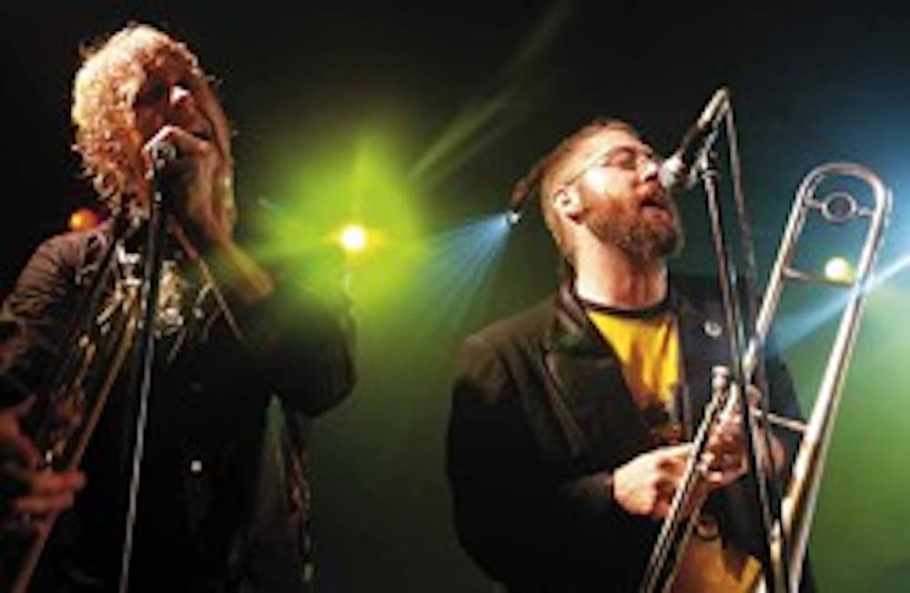 Reel Big Fish trumpet player John Christianson, left, and trombone player Dan Regan. Reel Big Fish will perform at Fiestas, along with other acts on Saturday on Johnson Field.   