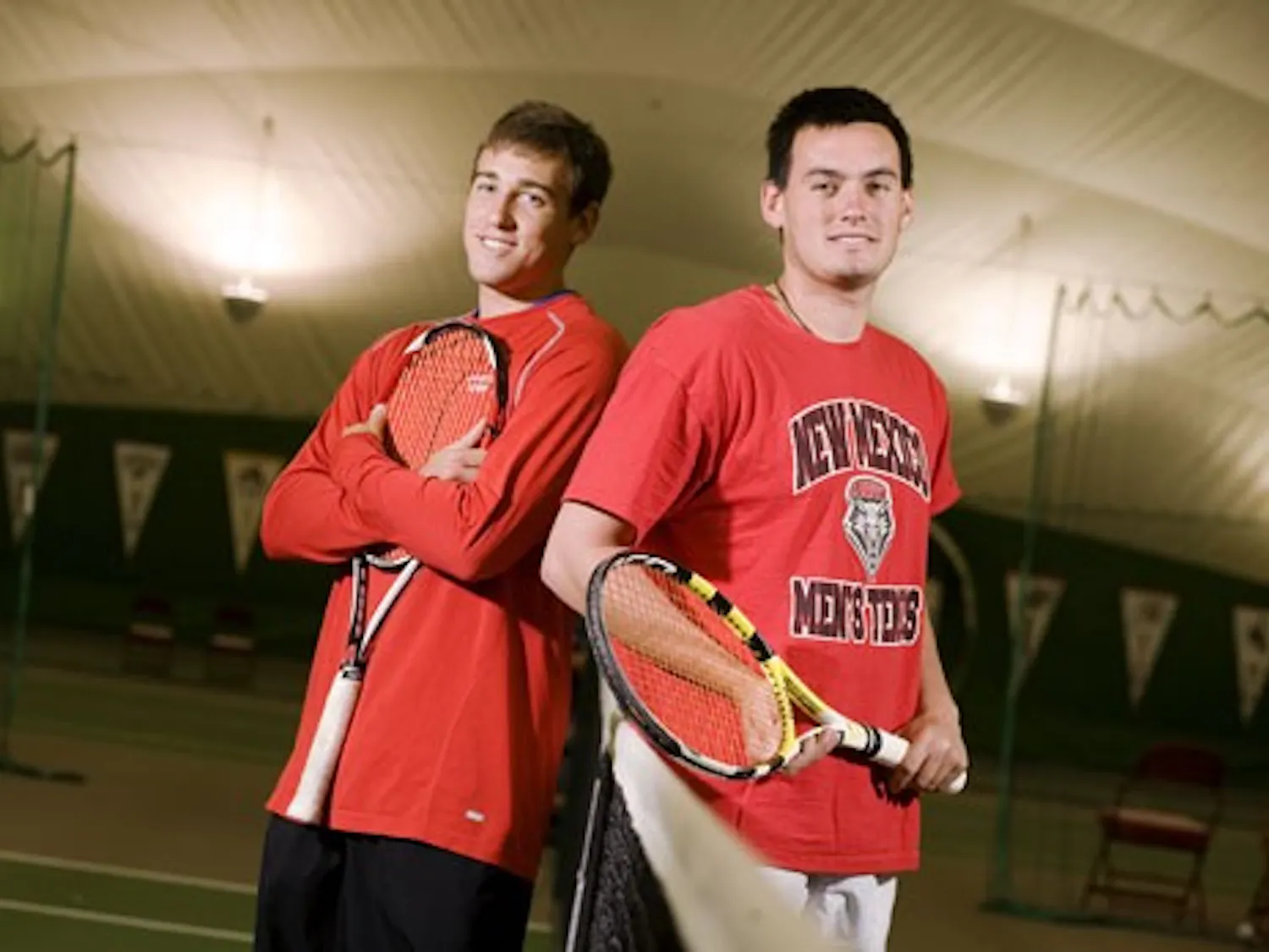 Johnny, left, and Chris Parkes have played a big role on the UNM men's tennis team. The brothers' close relationship has helped them succeed on and off the court.