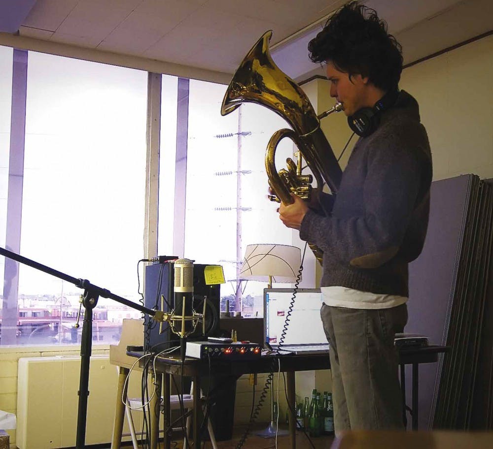 Zach Condon, front man for the band Beirut, plays a baritone in an Albuquerque studio at 120 Madeira Drive N.E. 