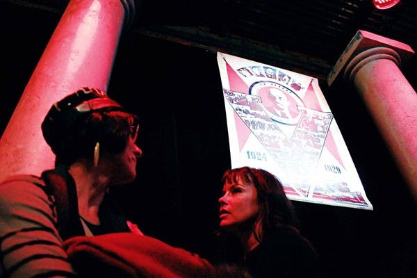 Laurie Thomas, left, and Jecqueline Reid talk after watching a film at the Brave New World film series at the Cell Theatre on Saturday.