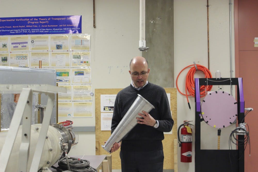 Professor Edl Schamiloglu discusses lab projects Wednesday afternoon at the Electrical and Computer Engineering lab. Dr. Schamiloglu recently received the Nuclear and Plasma Society?s Pulsed Power Science and Technology Committees Peter Haas Award. The award is given to individuals whose efforts have benefited research, education and information exchange. 
