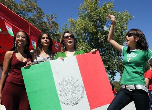 Members of the Mexican Student Association celebrate Mexican Independence Day on Tuesday near the SUB. The event included a flag raising. 