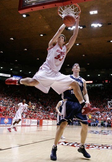 Daniel Faris had a game-high 19 points, including this dunk, as the Lobos eased past the Cougars 81-62 on Saturday at The Pit. Saturday's win marked UNM's first win over BYU since the 2000 Mountain West Conference Tournament.