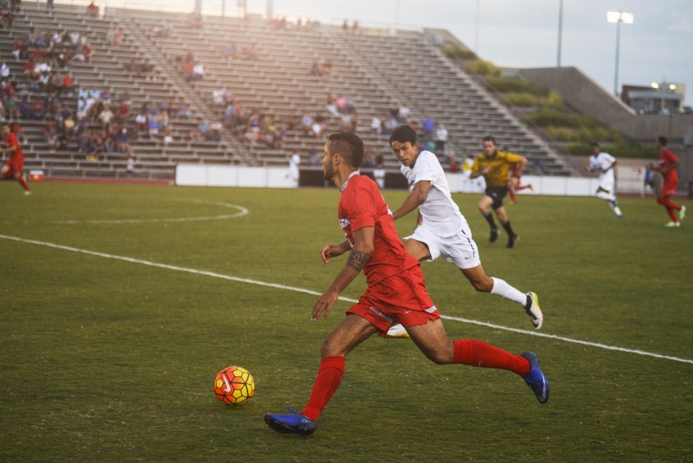Senior forward Niko Hansen looks down field as he drives to Washington Universitie's net during an exhibition on Saturday, August 20, 2016 at the UNM Soccer Complex. The Lobos are winless to begin the season after losing to Indiana and Notre Dame over the weekend.&nbsp;