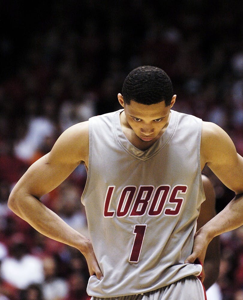 	Darington Hobson stews with anger after fouling San Diego State’s D.J. Gay and sending him to the free-throw line with an opportunity to win the game. Gay converted two of the three free throws, but the Lobos prevailed the Aztecs 88-86 in overtime. 