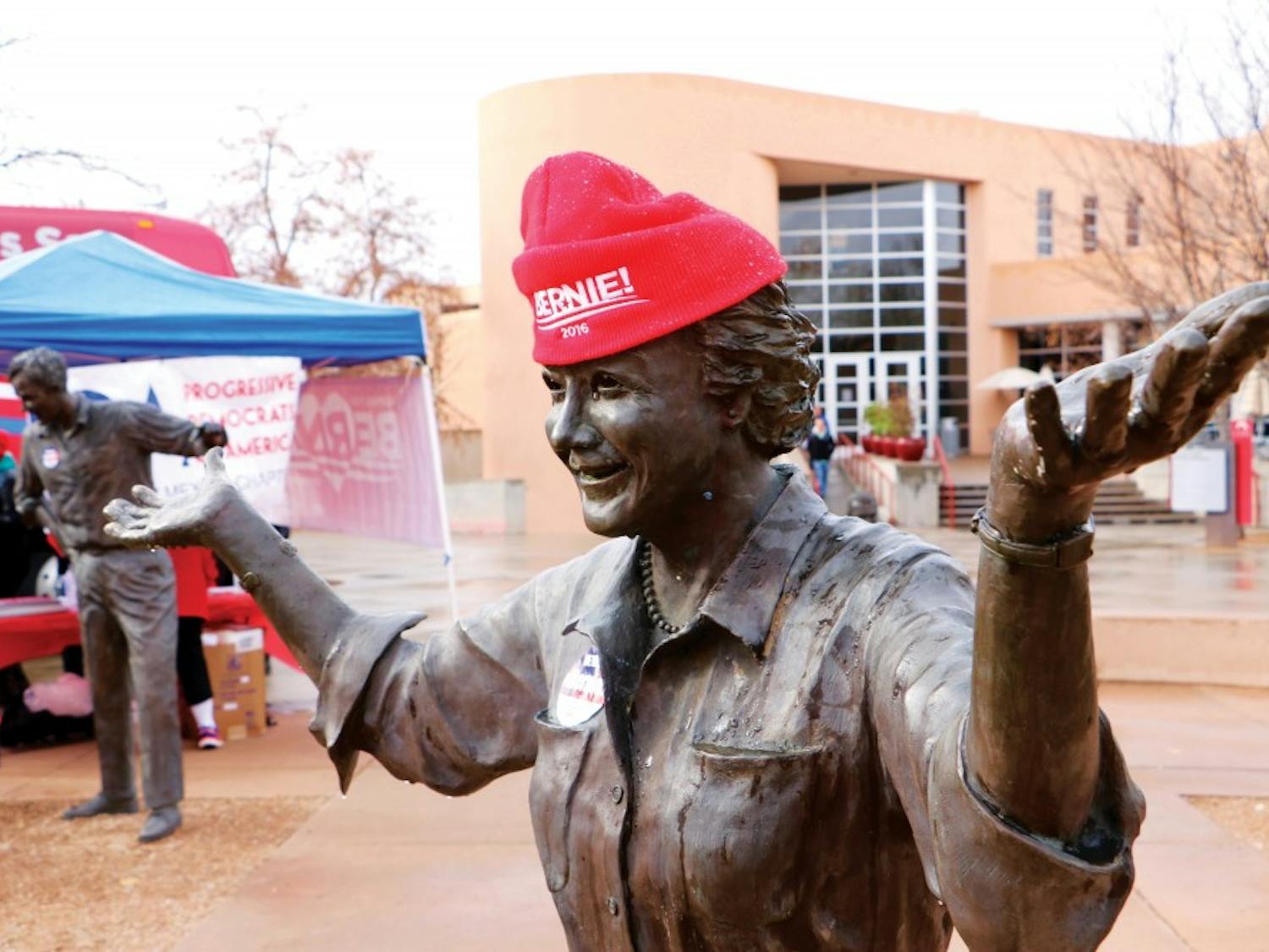 A pro-Bernie Sanders hat adorns a statue near the SUB. Supporters of the democratic presidential candidate gathered to give out free hats, pins and stickers to students on Tuesday.