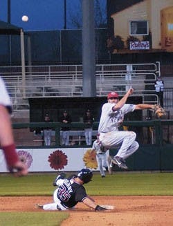 Former Lobo Ryan Barba completes a double play April 4 at the Lobos' exhibition game against the Isotopes at Isotopes Park.