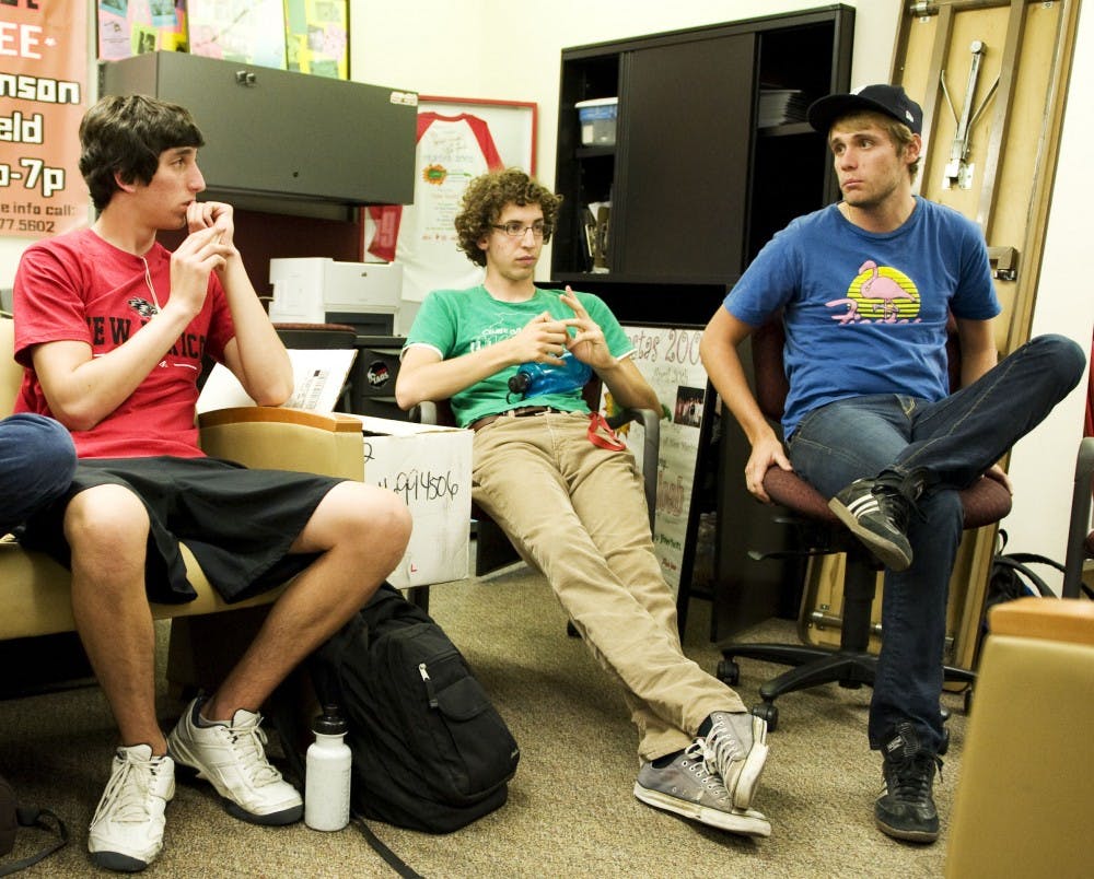 	Bryan Jurus (far right), director of Student Special Events, talks with students in the SSE office downstairs in the SUB about ideas they have for upcoming events on campus. In the photo from left to right are students Jeff Gallegos and Alex Borowski.

