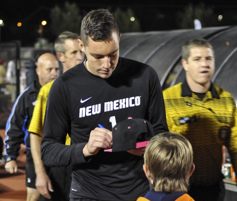 Lobo senior goalkeeper Jason Beaulieu, autographs a cap following a game against the University of Denver Pioneers on Oct. 25, 2017. The game ended in a 0-0 draw and included two overtime periods.