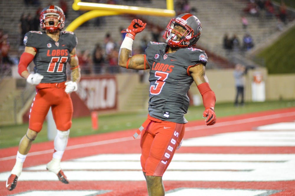 Junior running back Richard McQuarley celebrates in the Lobo’s end zone during their game against ULM at University Stadium on Sunday, Oct. 23, 2016. The Lobos beat Hawaii University 28-21 this past Saturday.