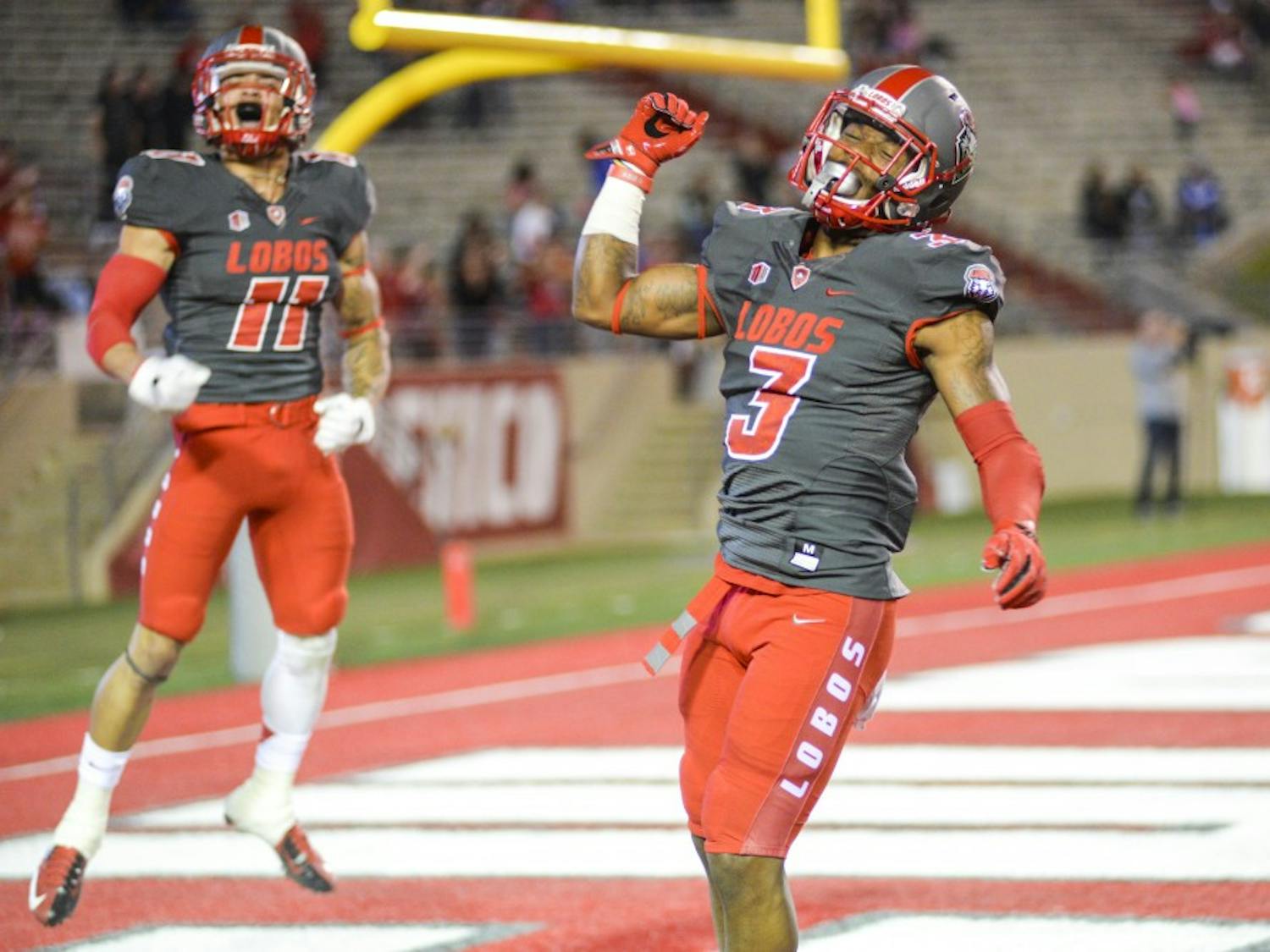 Junior running back Richard McQuarley celebrates in the Lobo’s end zone during their game against ULM at University Stadium on Sunday, Oct. 23, 2016. The Lobos beat Hawaii University 28-21 this past Saturday.