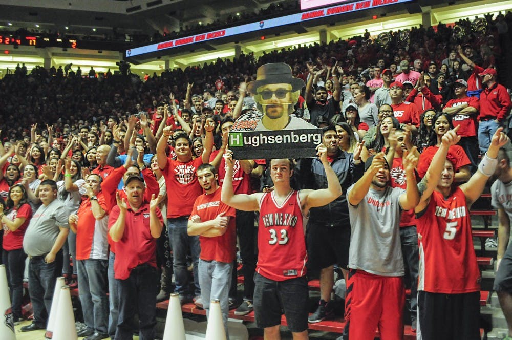 Group of students cheers for Lobos on the game against Wyoming in March 7. UNM mens and womens basketball games topped attendance in the 2014 Mountain West this past season.
