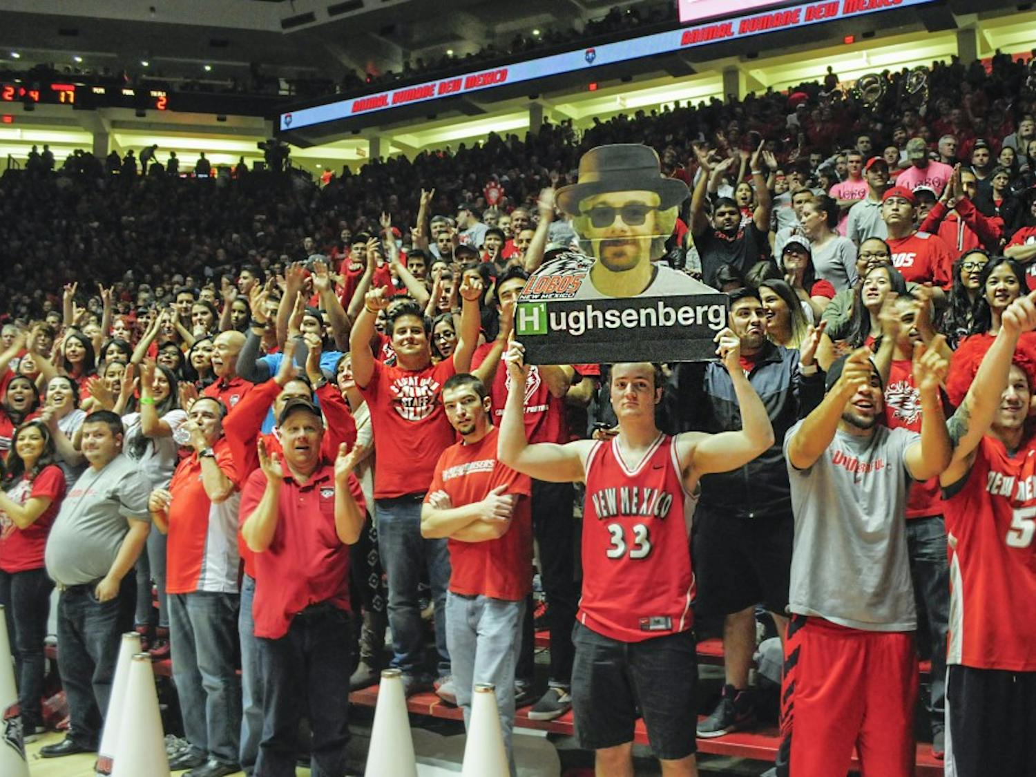 Group of students cheers for Lobos on the game against Wyoming in March 7. UNM mens and womens basketball games topped attendance in the 2014 Mountain West this past season.
