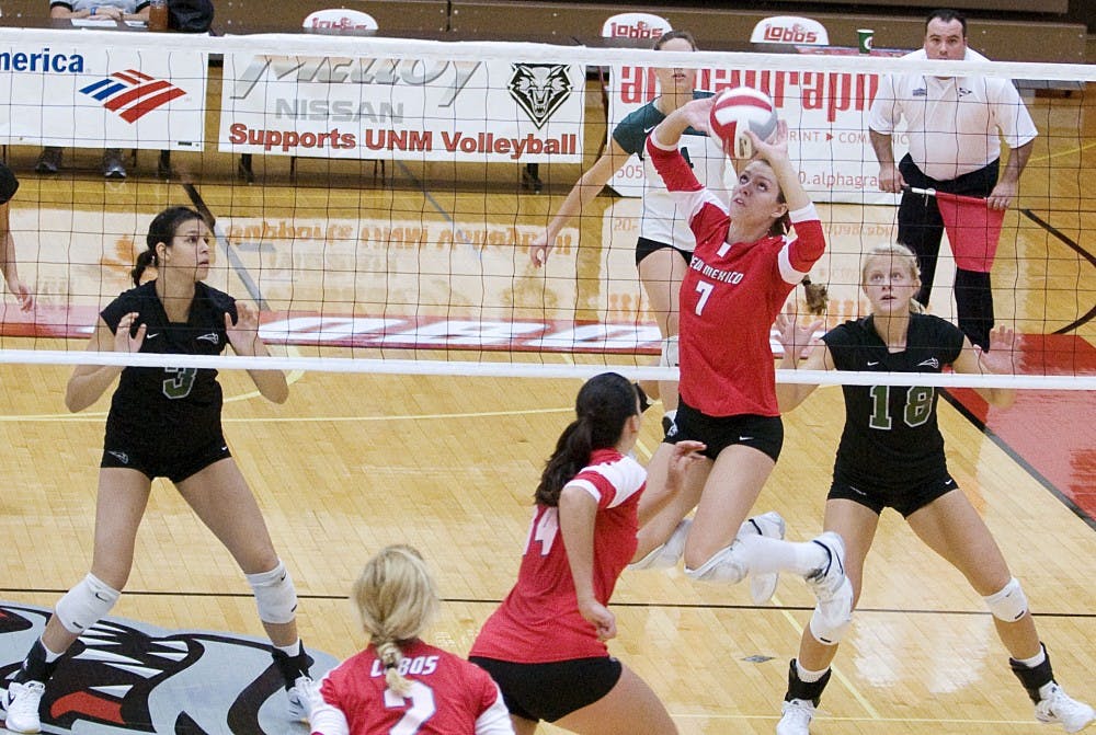 	Jade Michaelsen sets up a teammate Saturday at Johnson Gym. The Lobos swept the MCM Elegante Lobo Classic this past weekend.