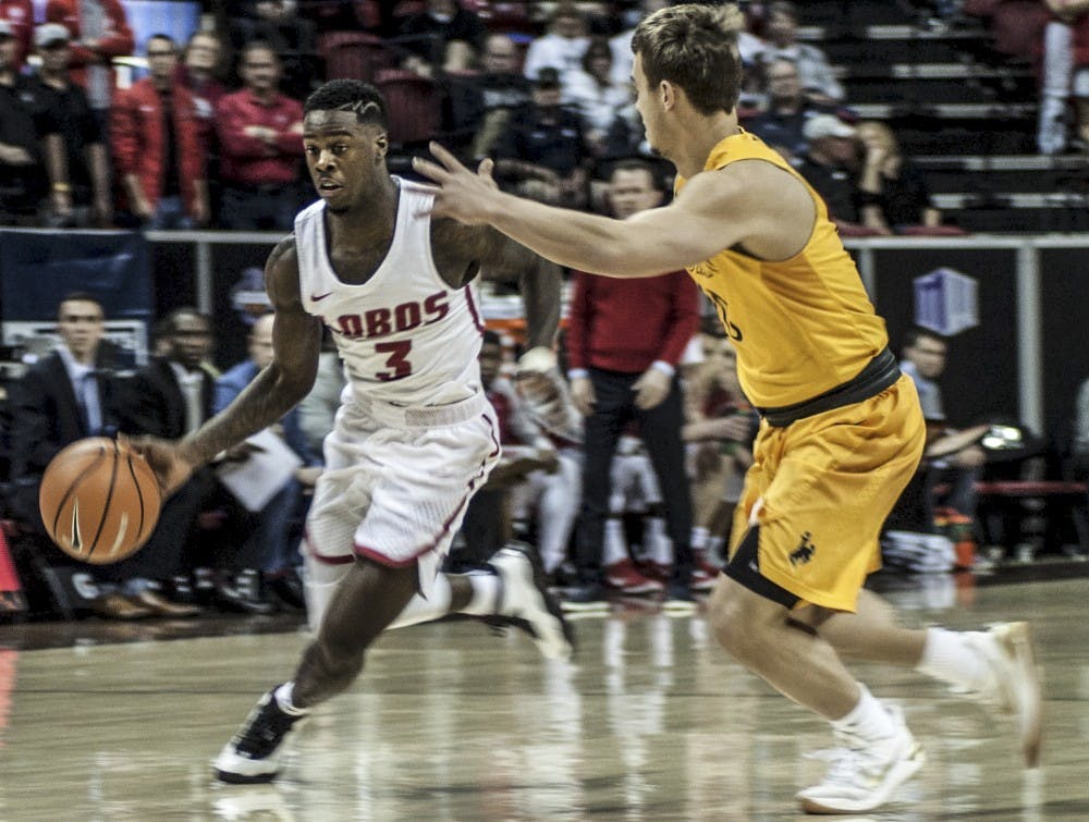 Antino Jackson looks to drive during the first half of a game against Wyoming at Thomas & Mack Arena in Las Vegas, Nevada. The Lobos won 85-75.