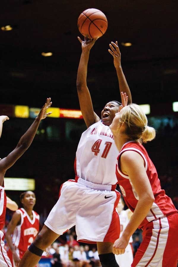UNM's Brandi Kimble shoots during a 79-49 win over Nicholls State at The Pit on Friday. The Lobos went on to beat Oregon Saturday to clinch the Albuquerque Midtown Tournament title.