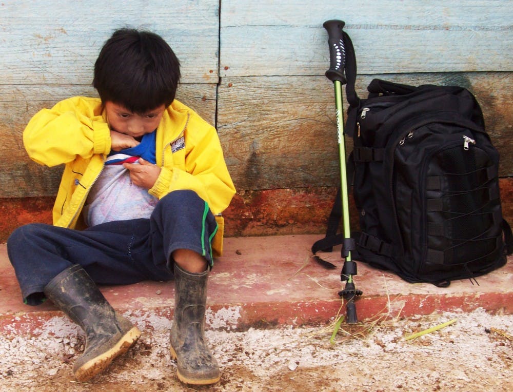 	A child in Polhó (known to priístas as Chenalhó) in the hills of Chiapas. People living in this village lack running water and electricity, and many of the children are malnourished