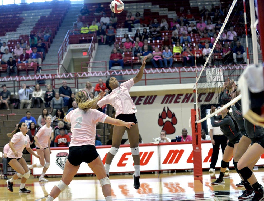 Middle blocker Simone Henderson leaps for a kill against UNLV at Johnson Center on Saturday. The Lobos play the Nevada Wolf Pack in Reno this Thursday.