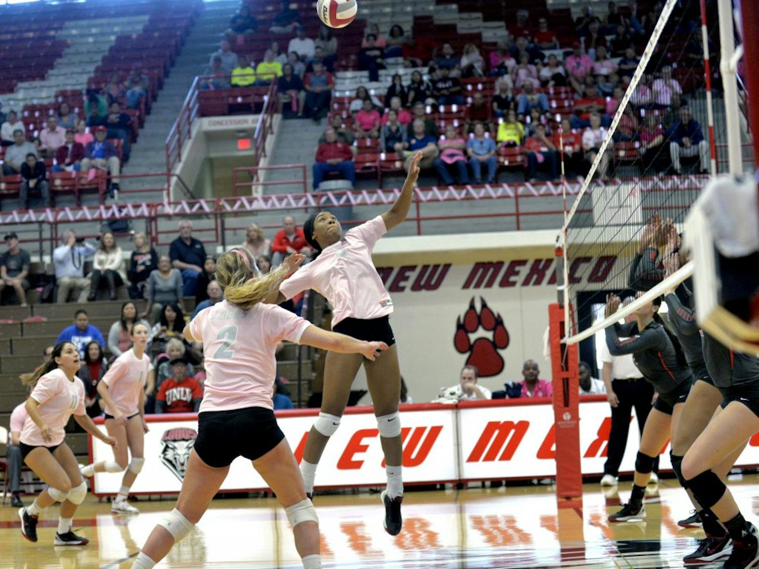 Middle blocker Simone Henderson leaps for a kill against UNLV at Johnson Center on Saturday. The Lobos play the Nevada Wolf Pack in Reno this Thursday.