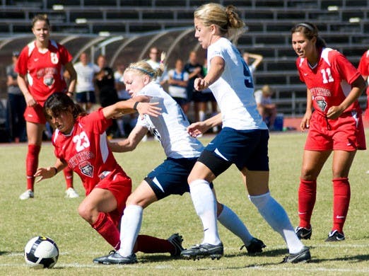 Lobo defender Zaneta Wyne fights for the ball during Saturday's 2-1 loss to BYU. UNM dropped to 7-5-4 overall and 2-3 in the Mountain West Conference. 