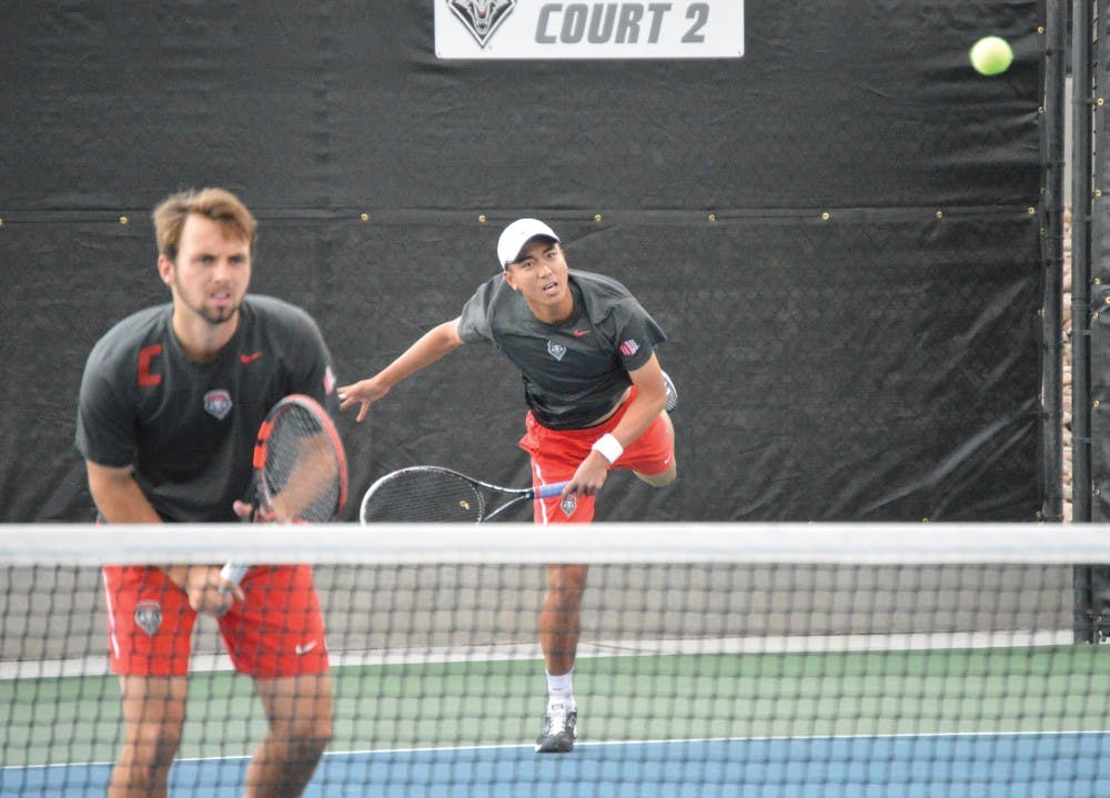 Senior James Hignett and Augustus Ge, play double against Air Force on April 24 at McKinnon Family Tennis Stadium. Hignett and Augustus won the set against Air Force in the No. 2 spot. 